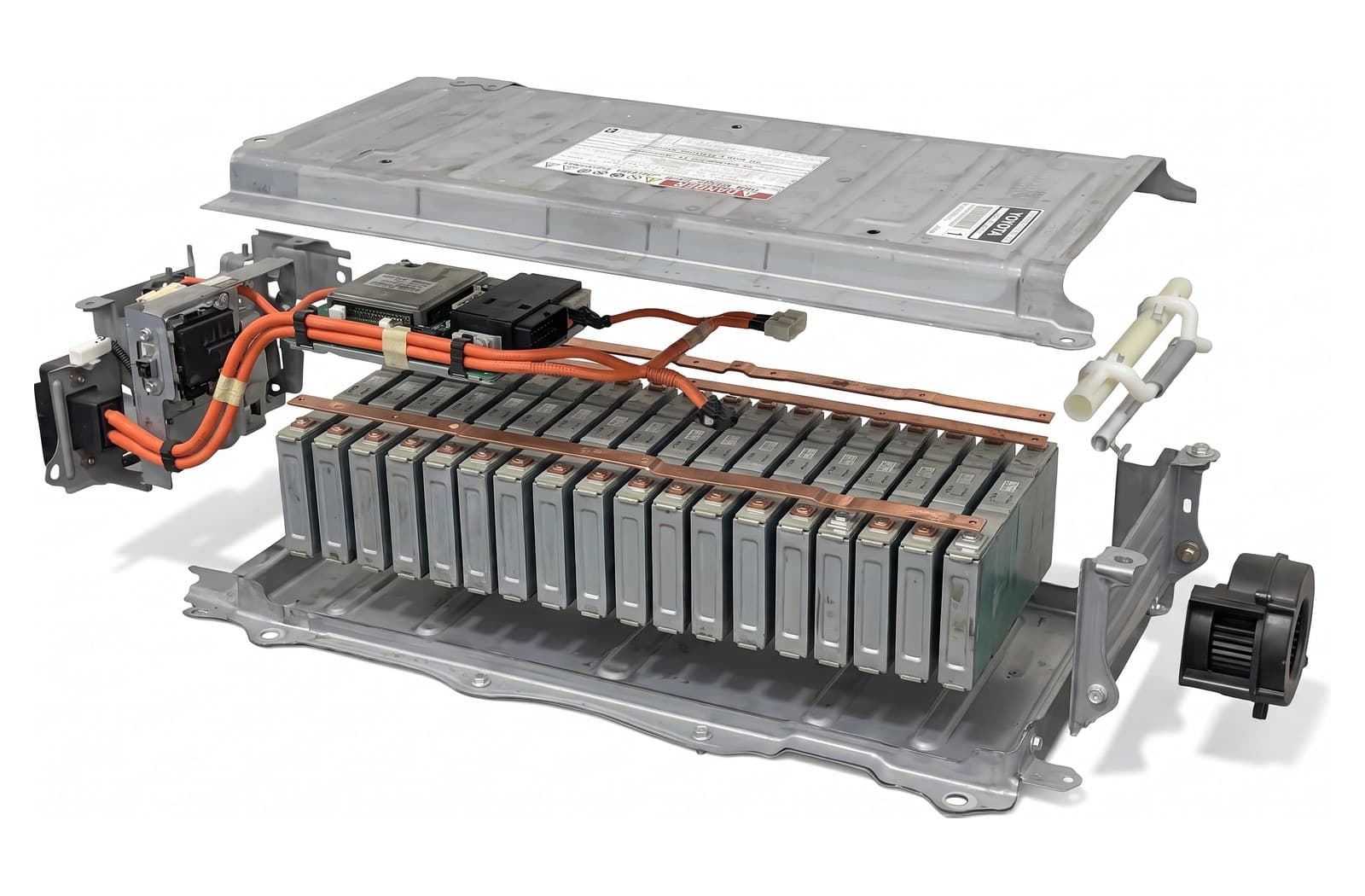 A Toyota hybrid battery pack fully disassembled — the case, wiring, every cell module and the cooling fan laid out in order